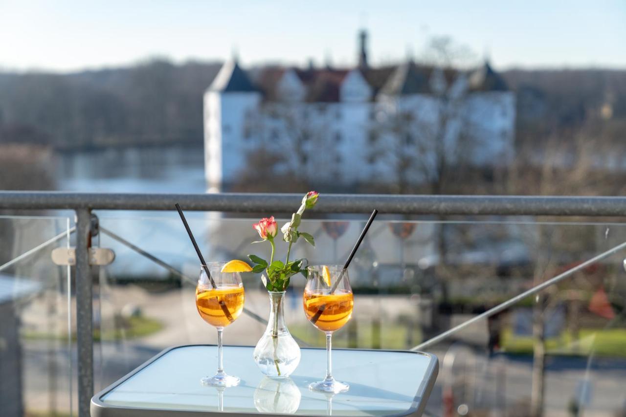 Hotel Am Wasserschloss Глюксбург Экстерьер фото